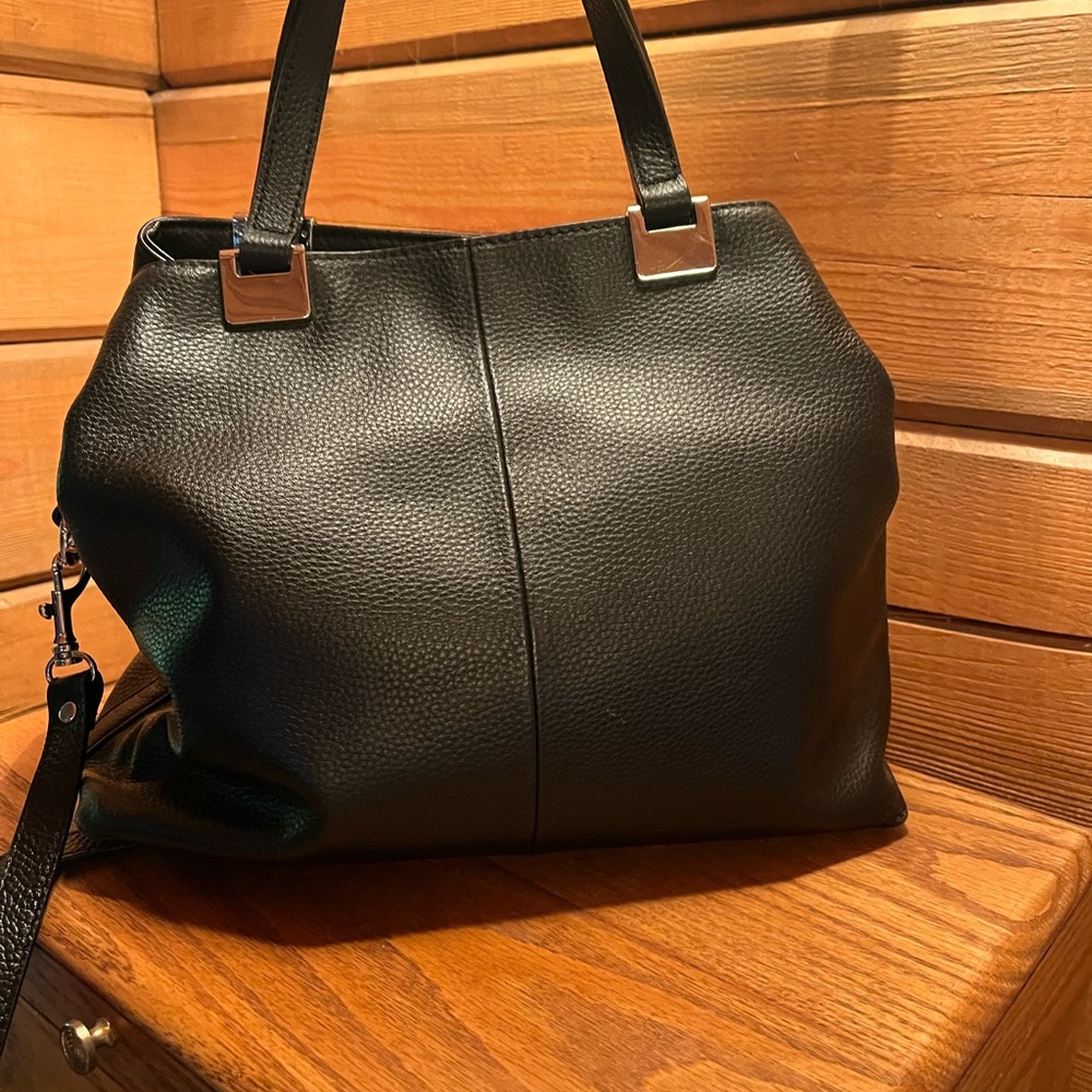 Black leather handbag by Vince Camuto